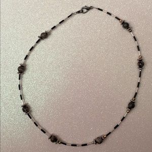 Silver and black 19” handcrafted necklace with assorted agate beads.